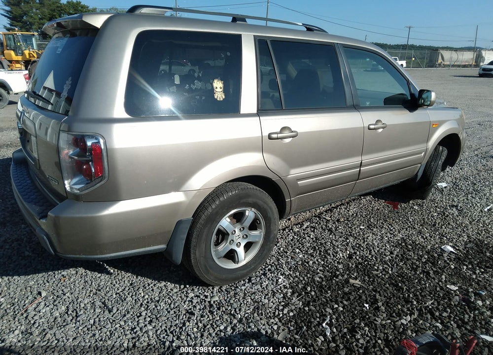 2007 HONDA PILOT EX-L VIN: 5FNYF186X7B007582