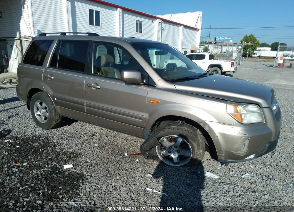 2007 HONDA PILOT EX-L VIN: 5FNYF186X7B007582