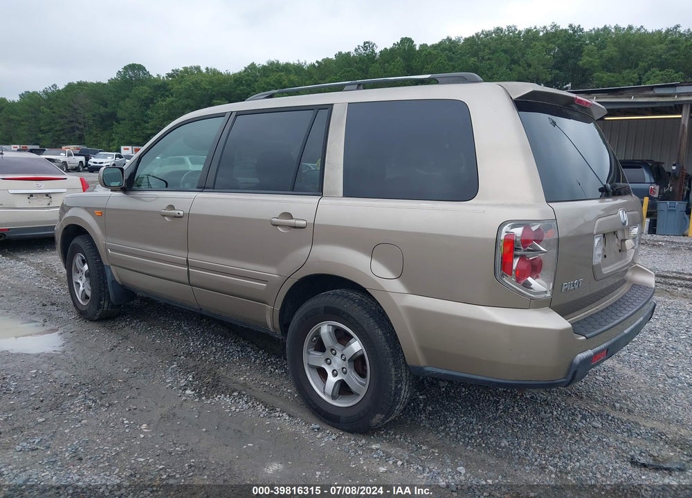 2007 HONDA PILOT EX-L VIN: 5FNYF28777B023138