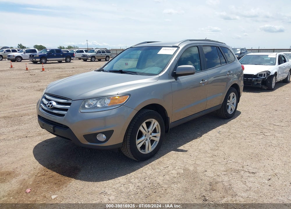 2012 HYUNDAI SANTA FE SE VIN: 5XYZHDAGXCG108580
