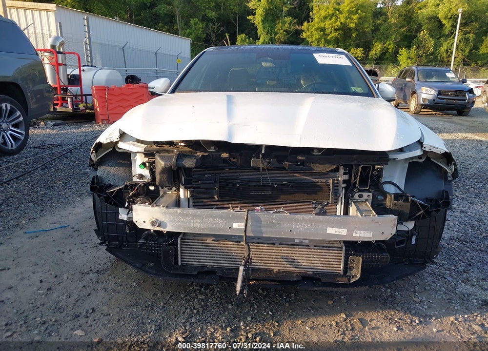 2022 GENESIS G70 3.3T AWD VIN: KMTG54TE9NU095447