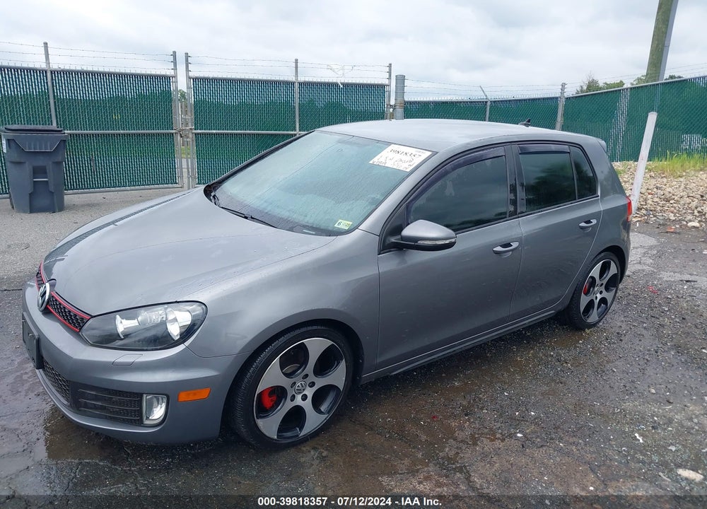 2013 VOLKSWAGEN GTI 4-DOOR VIN: WVWHV7AJ1DW124690