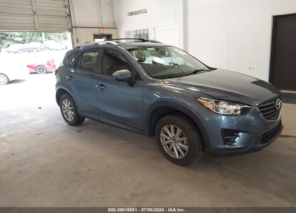 2016 MAZDA CX-5 SPORT VIN: JM3KE2BY7G0664094