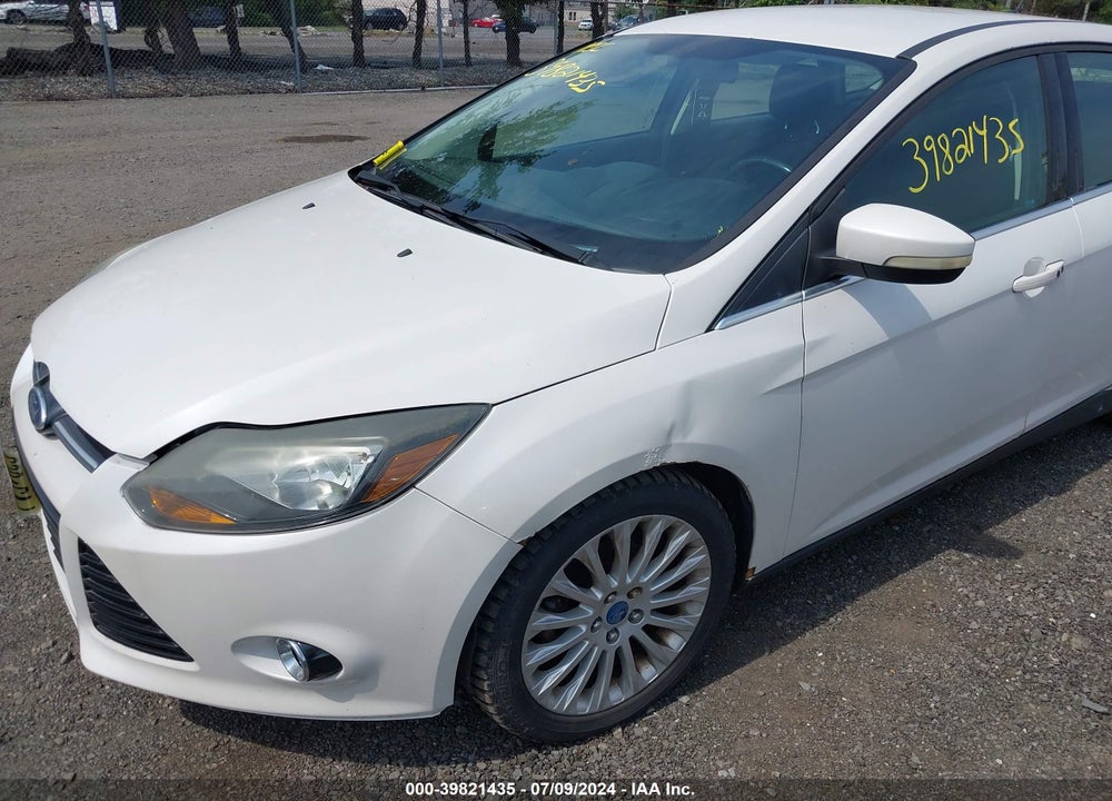 2012 FORD FOCUS TITANIUM VIN: 1FAHP3N22CL311187