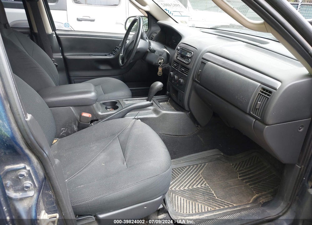 2003 JEEP GRAND CHEROKEE LAREDO VIN: 1J4GX48S73C558044