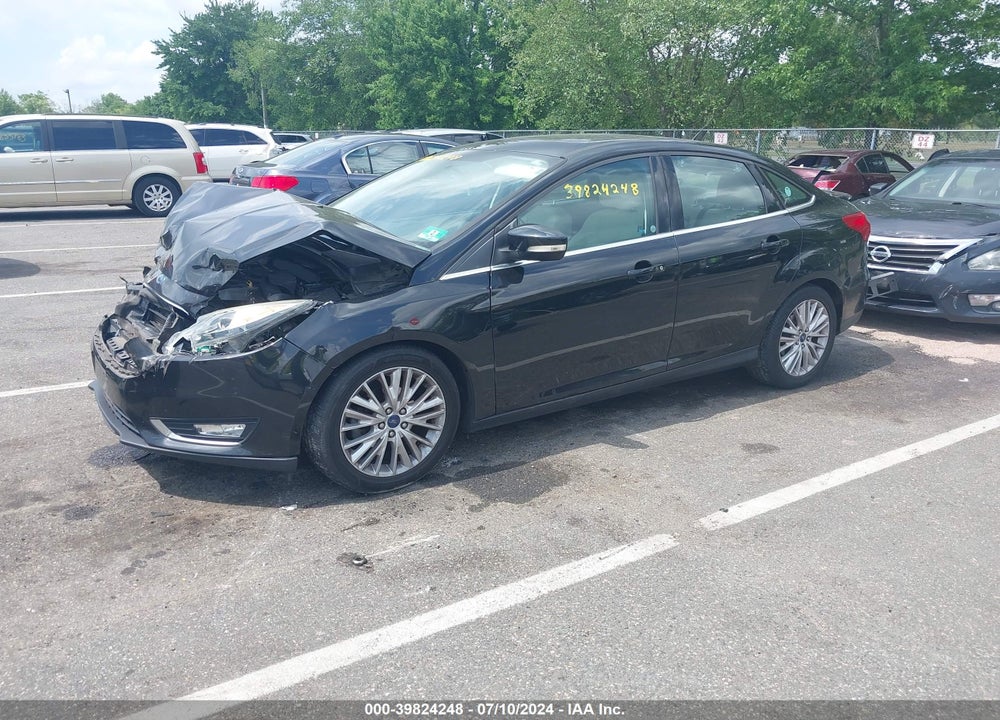 2015 FORD FOCUS TITANIUM VIN: 1FADP3J20FL297590