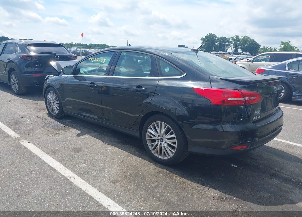 2015 FORD FOCUS TITANIUM VIN: 1FADP3J20FL297590