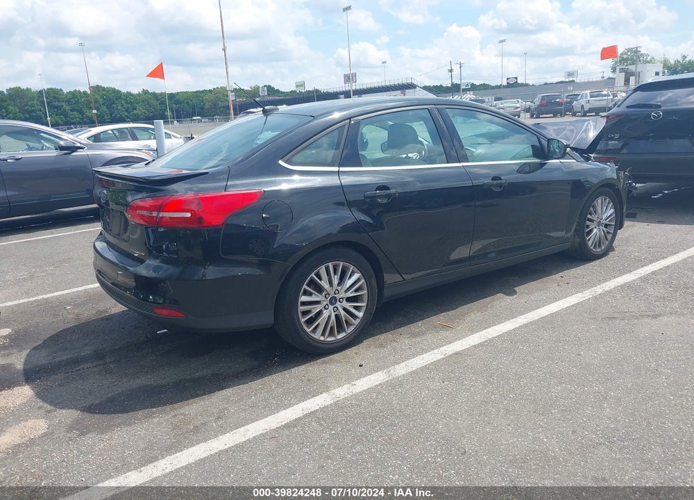 2015 FORD FOCUS TITANIUM VIN: 1FADP3J20FL297590