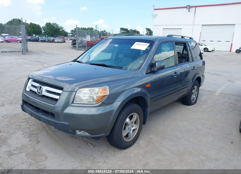 2007 HONDA PILOT EX-L VIN: 5FNYF28757B006497