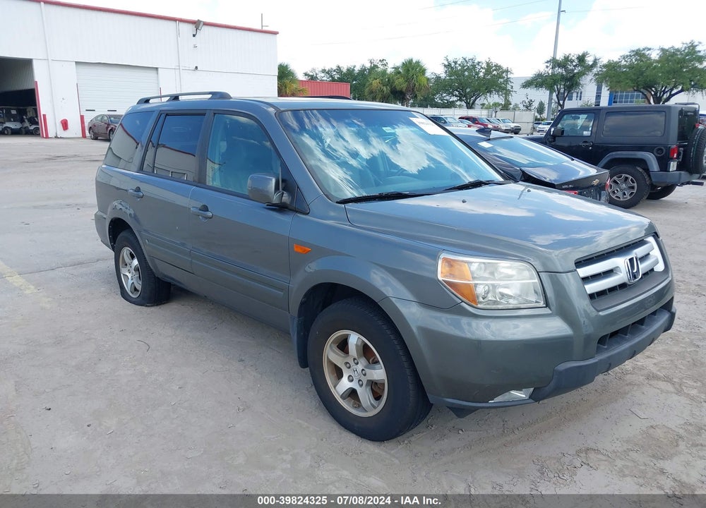 2007 HONDA PILOT EX-L VIN: 5FNYF28757B006497