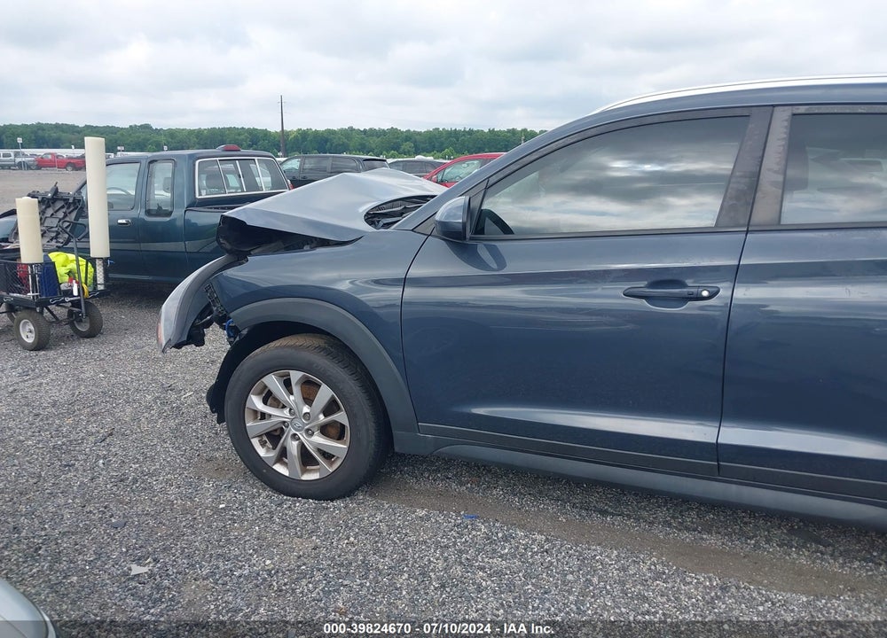 2019 HYUNDAI TUCSON VALUE VIN: KM8J33A40KU049754