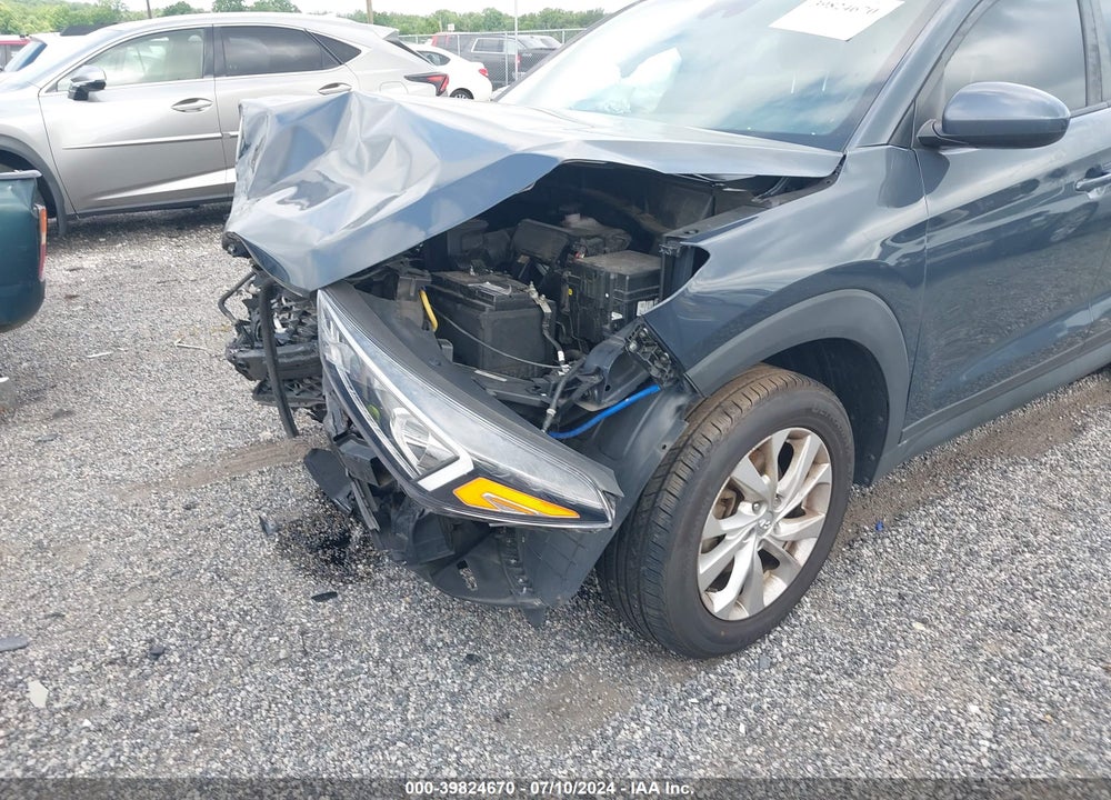 2019 HYUNDAI TUCSON VALUE VIN: KM8J33A40KU049754