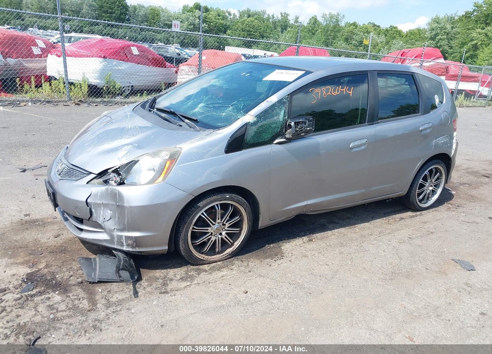 2010 HONDA FIT VIN: JHMGE8H24AC031352