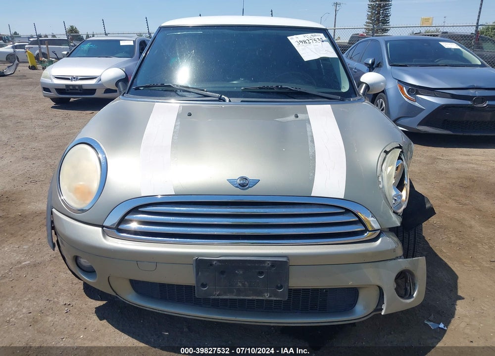 2010 MINI COOPER VIN: WMWMF3C52ATZ24834