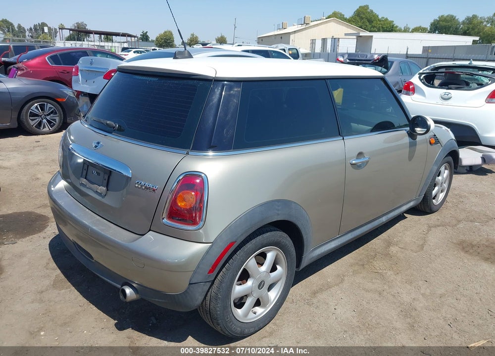 2010 MINI COOPER VIN: WMWMF3C52ATZ24834