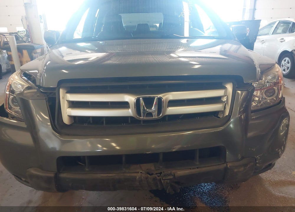 2007 HONDA PILOT EX-L VIN: 5FNYF28757B043050