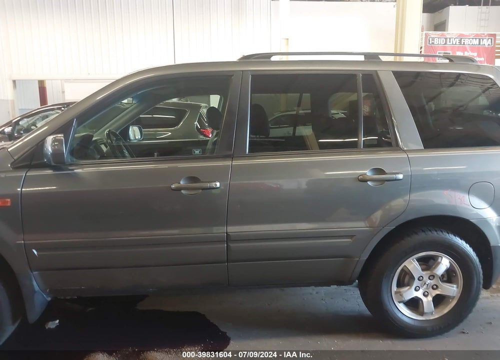 2007 HONDA PILOT EX-L VIN: 5FNYF28757B043050
