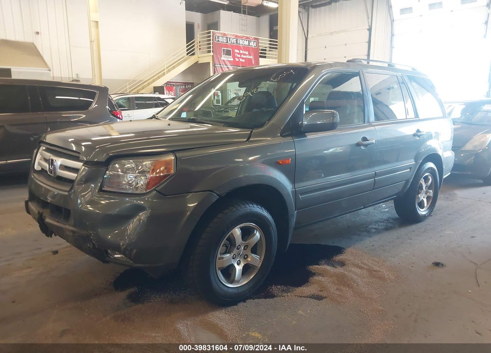 2007 HONDA PILOT EX-L VIN: 5FNYF28757B043050