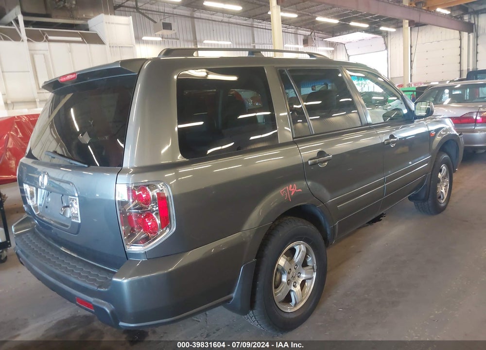 2007 HONDA PILOT EX-L VIN: 5FNYF28757B043050