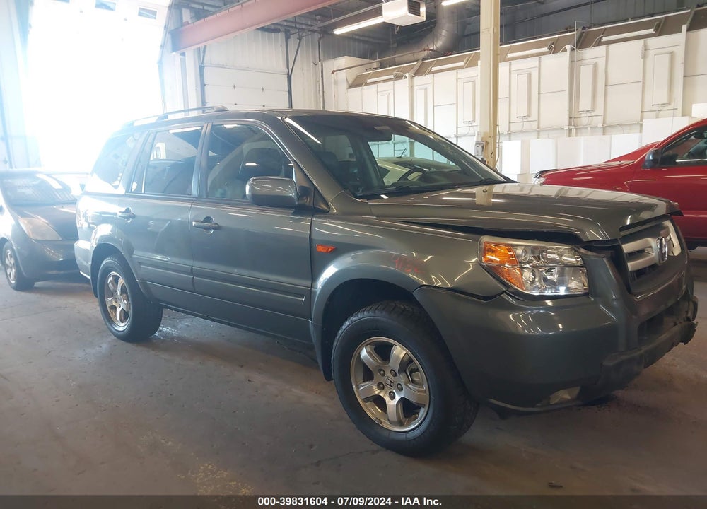 2007 HONDA PILOT EX-L VIN: 5FNYF28757B043050