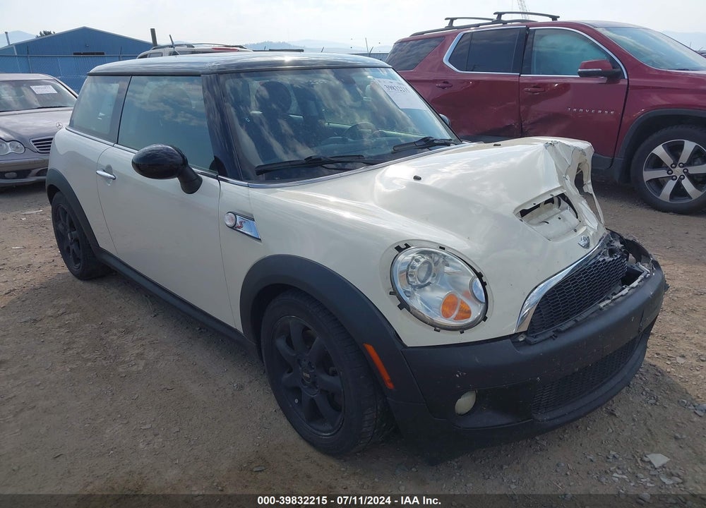 2009 MINI COOPER S VIN: WMWMF73529TV39888