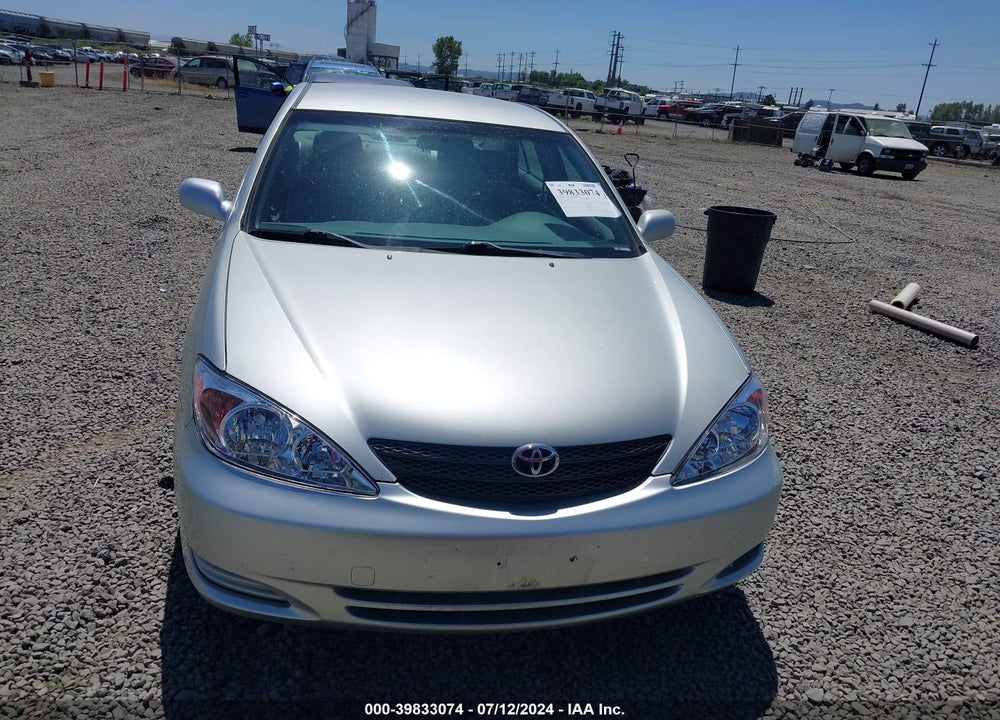 2003 TOYOTA CAMRY LE VIN: JTDBE32K330142390