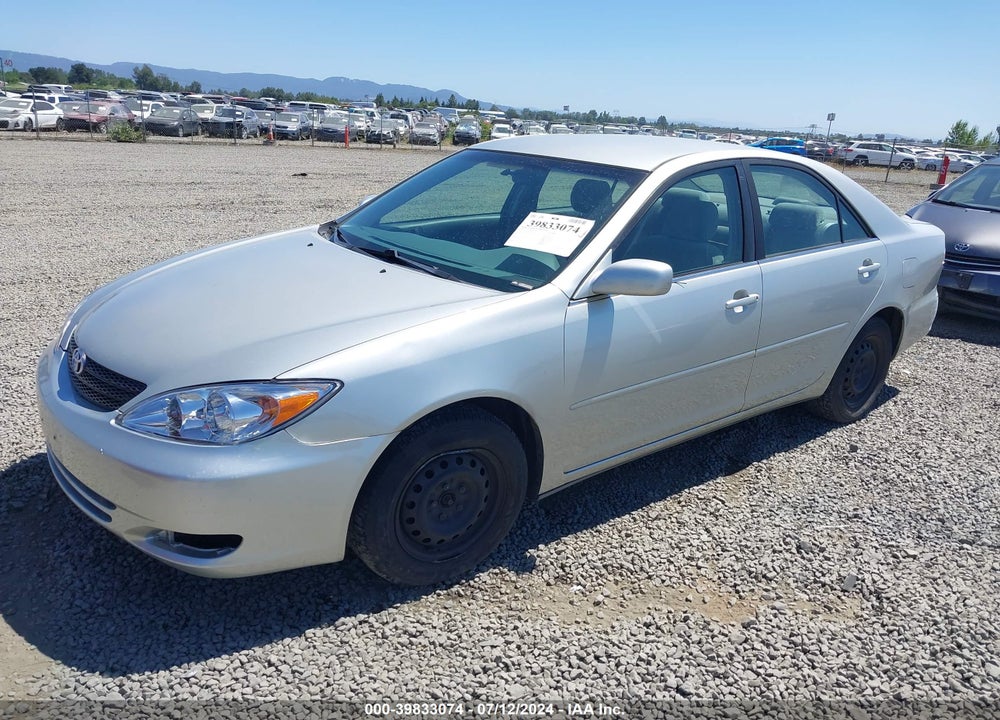 2003 TOYOTA CAMRY LE VIN: JTDBE32K330142390