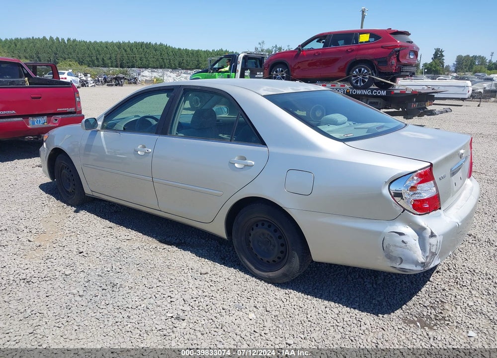 2003 TOYOTA CAMRY LE VIN: JTDBE32K330142390