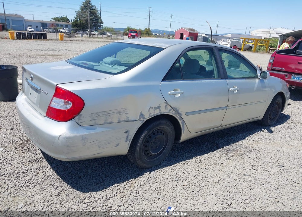2003 TOYOTA CAMRY LE VIN: JTDBE32K330142390