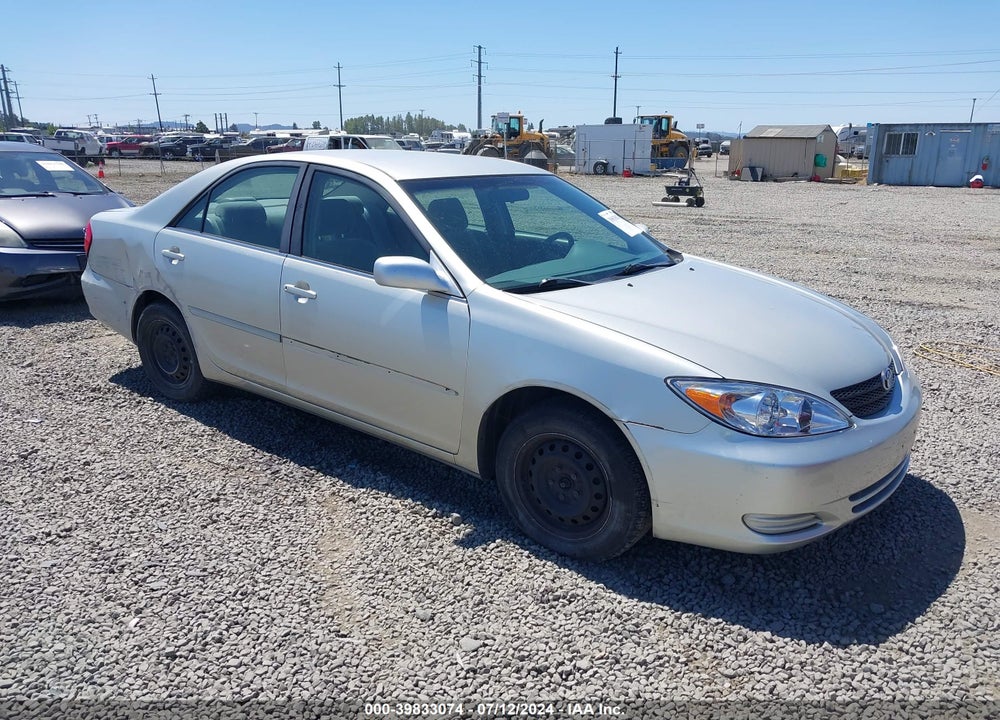 2003 TOYOTA CAMRY LE VIN: JTDBE32K330142390