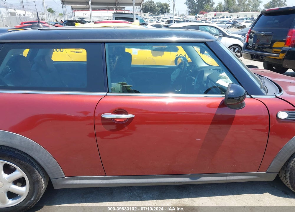 2009 MINI COOPER VIN: WMWMF33509TW70892