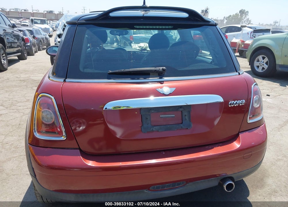 2009 MINI COOPER VIN: WMWMF33509TW70892