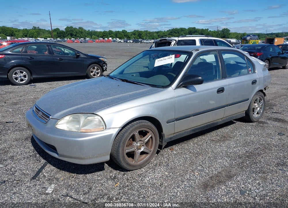 1997 HONDA CIVIC LX VIN: JHMEJ657XVS037143