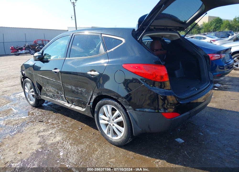 2011 HYUNDAI TUCSON LIMITED VIN: KM8JU3AC4BU283447