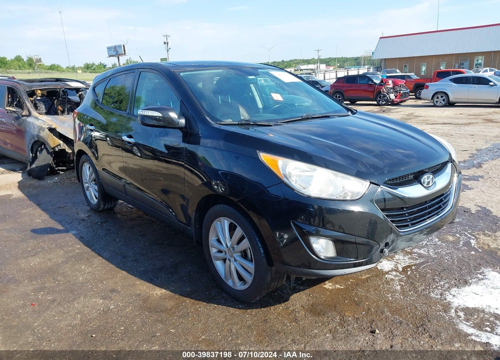 2011 HYUNDAI TUCSON LIMITED VIN: KM8JU3AC4BU283447
