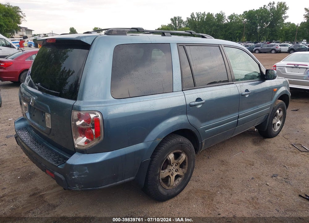 2007 HONDA PILOT EX-L VIN: 5FNYF286X7B008012