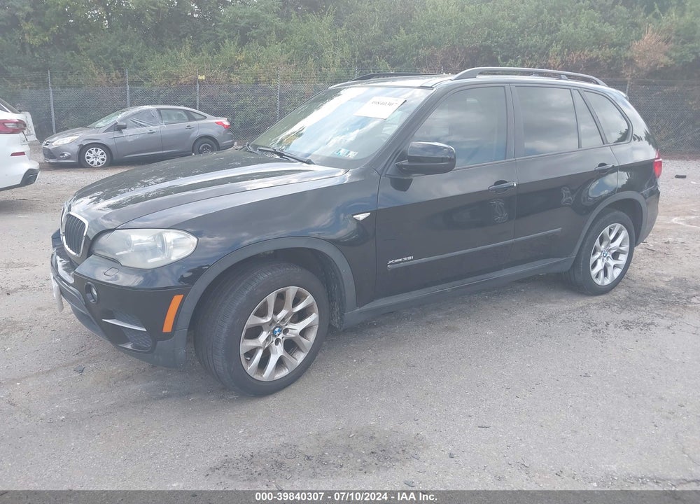 2012 BMW X5 XDRIVE35I/XDRIVE35I PREMIUM/XDRIVE35I SPORT ACTIVITY VIN: 5UXZV4C52CL760052