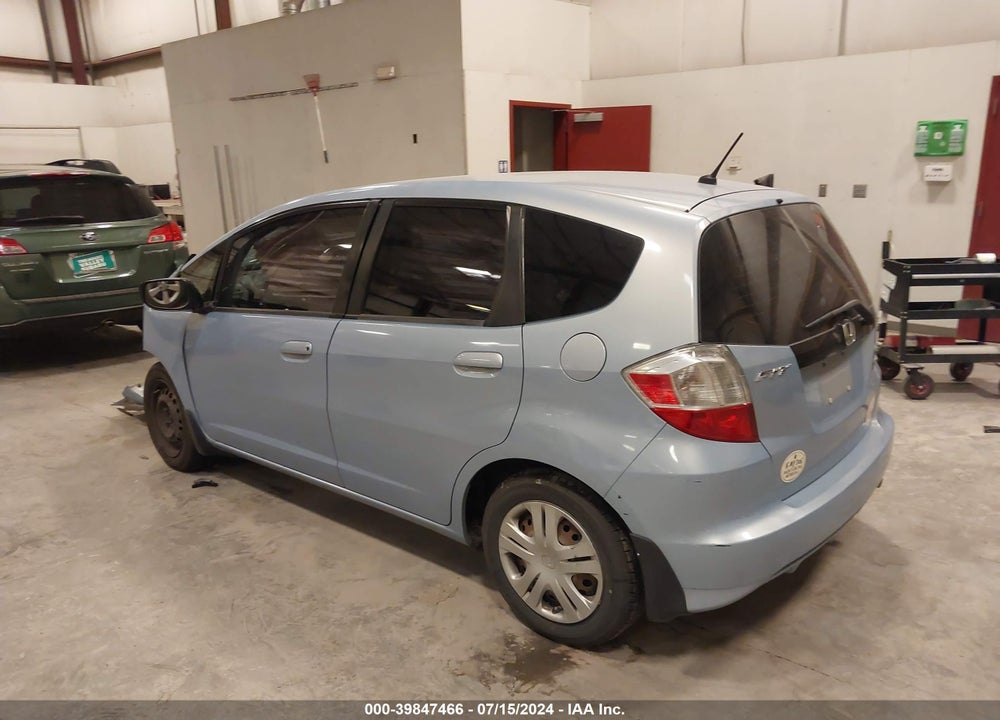 2009 HONDA FIT VIN: JHMGE882X9C003079