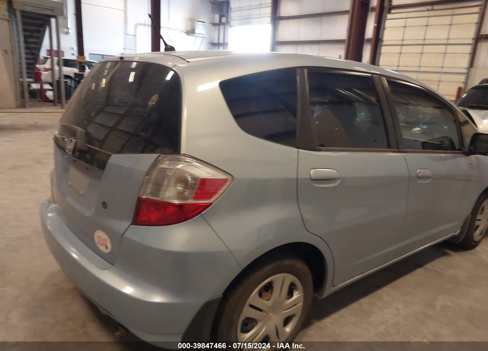 2009 HONDA FIT VIN: JHMGE882X9C003079