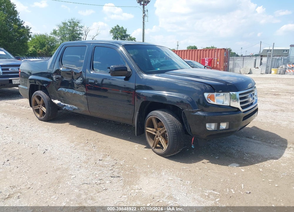 2012 HONDA RIDGELINE RTL VIN: 5FPYK1F50CB002883