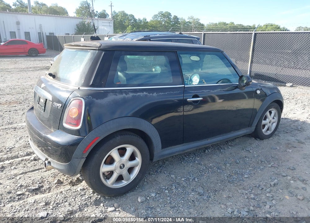 2010 MINI COOPER VIN: WMWMF3C5XATZ24077