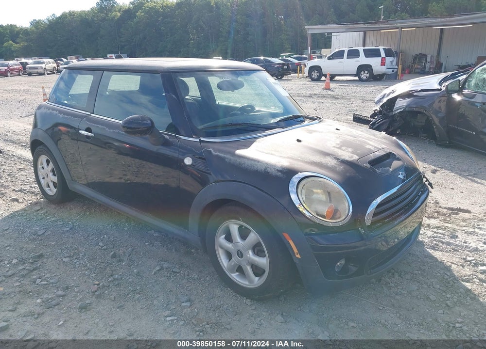 2010 MINI COOPER VIN: WMWMF3C5XATZ24077