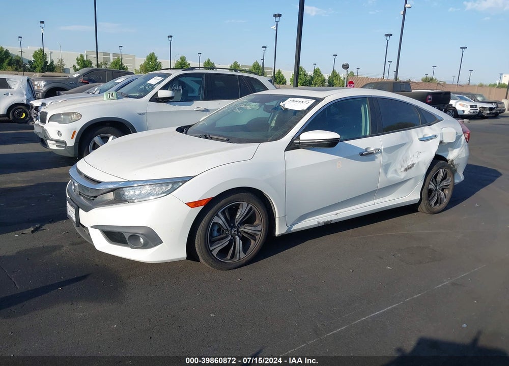 2016 HONDA CIVIC TOURING VIN: 19XFC1F94GE200104