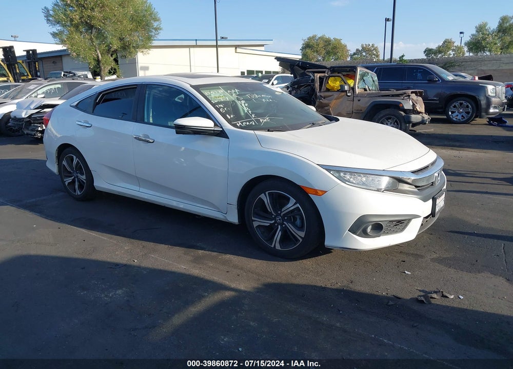 2016 HONDA CIVIC TOURING VIN: 19XFC1F94GE200104