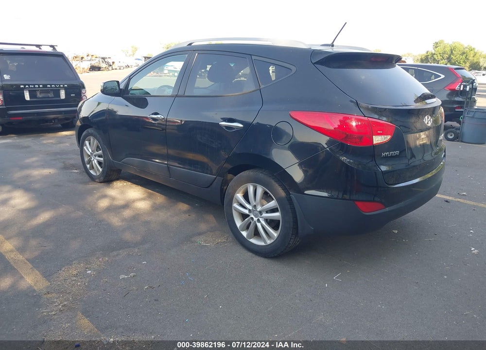 2013 HYUNDAI TUCSON LIMITED VIN: KM8JUCAC9DU553940