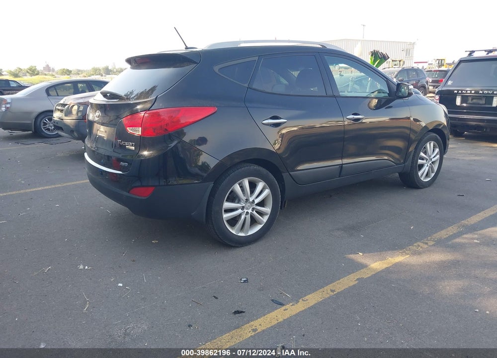 2013 HYUNDAI TUCSON LIMITED VIN: KM8JUCAC9DU553940