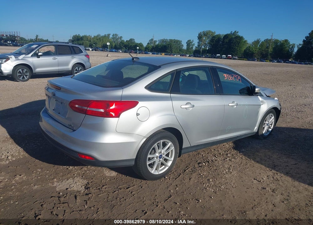 2016 FORD FOCUS SE VIN: 1FADP3F2XGL406678
