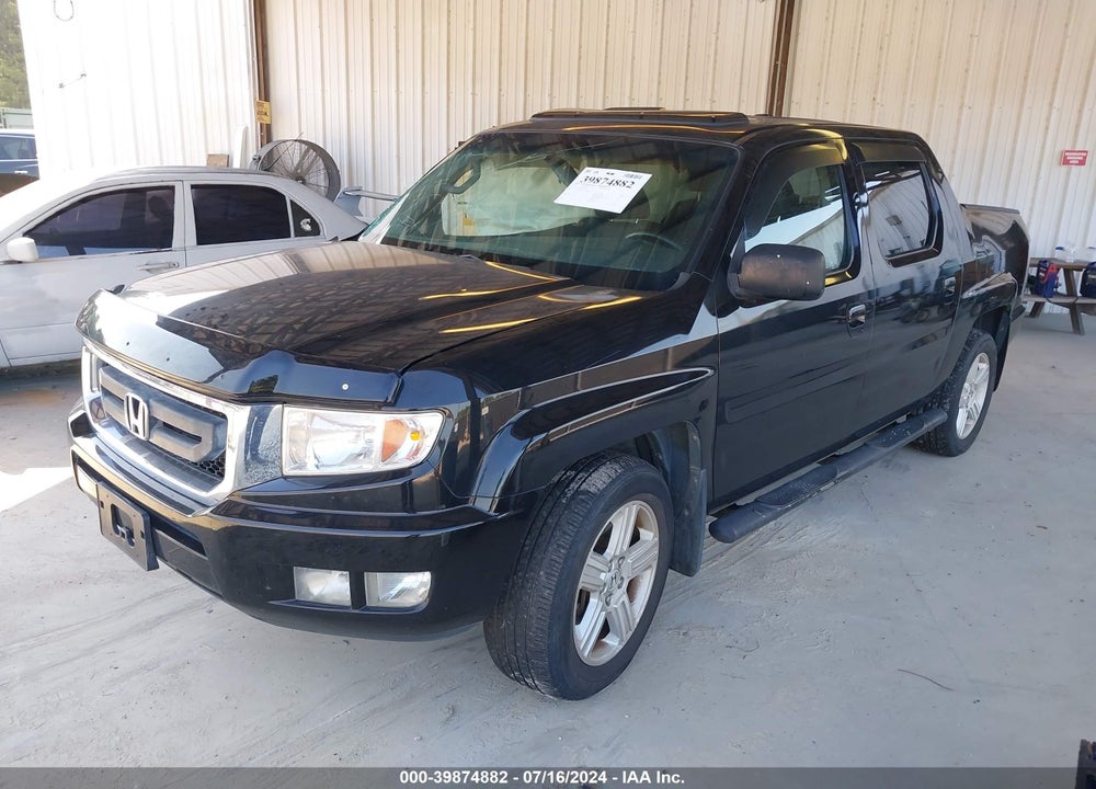 2011 HONDA RIDGELINE RTL VIN: 5FPYK1F56BB002546