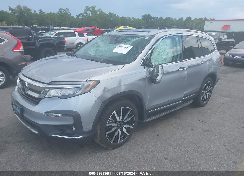 2021 HONDA PILOT 2WD TOURING 8 PASSENGER VIN: 5FNYF5H90MB027160