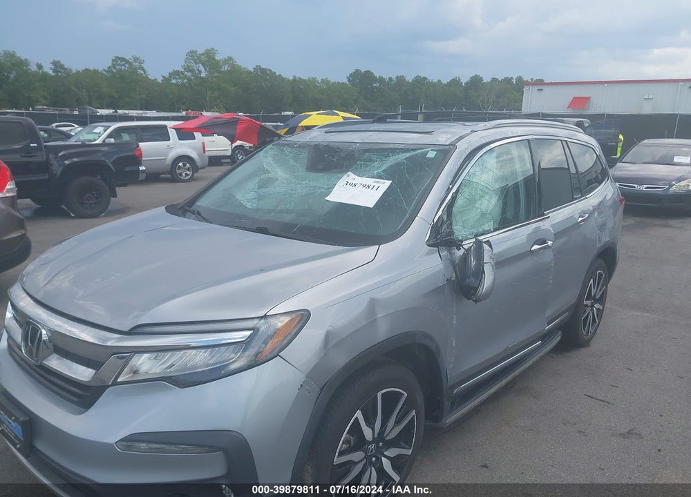 2021 HONDA PILOT 2WD TOURING 8 PASSENGER VIN: 5FNYF5H90MB027160